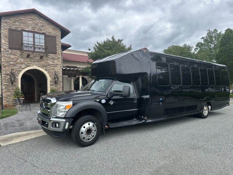 Black 26 passenger party Bus